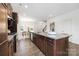 The kitchen showcases stainless appliances, a large island, and dark wood cabinets at 24078 Sailfish Dr # 1152, Lancaster, SC 29720