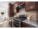 The kitchen features stainless steel appliances and granite countertops at 24078 Sailfish Dr # 1152, Lancaster, SC 29720