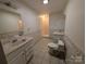 Clean bathroom with shower, toilet and double vanity at 327 Johnson Dairy Rd, Mooresville, NC 28115