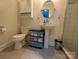 Small bathroom with pedestal sink, toilet, and shower at 327 Johnson Dairy Rd, Mooresville, NC 28115
