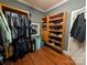 Large walk-in closet with ample hanging space and shelving at 327 Johnson Dairy Rd, Mooresville, NC 28115
