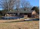 Brick ranch house with deck and above ground pool at 327 Johnson Dairy Rd, Mooresville, NC 28115