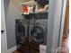Laundry room with LG washer and dryer and additional shelving at 327 Johnson Dairy Rd, Mooresville, NC 28115