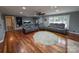 Spacious living area with hardwood floors, ample seating, and neutral decor at 327 Johnson Dairy Rd, Mooresville, NC 28115