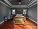 Bright main bedroom with hardwood floors and a ceiling fan at 327 Johnson Dairy Rd, Mooresville, NC 28115
