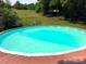 Inviting above ground pool with surrounding deck at 327 Johnson Dairy Rd, Mooresville, NC 28115