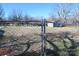 Backyard with chain link fence and small shed at 3463 Rock Creek Dr, Newton, NC 28658