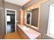 Bathroom with double vanity and wood cabinets at 3463 Rock Creek Dr, Newton, NC 28658
