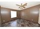 Spacious bedroom with ceiling fan and tile floor at 3463 Rock Creek Dr, Newton, NC 28658