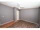 Bright bedroom with ceiling fan and wood floor at 3463 Rock Creek Dr, Newton, NC 28658