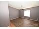 Simple bedroom with wood-look flooring at 3463 Rock Creek Dr, Newton, NC 28658
