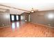 Spacious living room with laminate floors and a ceiling fan at 3463 Rock Creek Dr, Newton, NC 28658