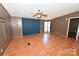 Spacious living room with laminate flooring and ceiling fan at 3463 Rock Creek Dr, Newton, NC 28658