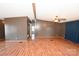 Spacious living area with laminate flooring and a ceiling fan at 3463 Rock Creek Dr, Newton, NC 28658