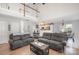 Two-story living room with hardwood floors and open floor plan at 3625 Stonefield Sw St, Concord, NC 28027