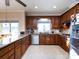 Eat-in kitchen with granite countertops and ample cabinet space at 3680 Bermuda Nw Ct, Concord, NC 28027