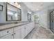 Bathroom boasts double vanity, granite countertop, and large walk-in shower at 4047 Blackburn Ct, Fort Mill, SC 29707