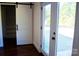 Bedroom with closet and French doors opening to the outdoors at 411 E Gary St, Candor, NC 27229