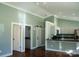 Modern kitchen with stainless steel appliances and an island at 411 E Gary St, Candor, NC 27229