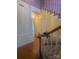 Two-story house interior with a staircase and hardwood floors at 4409 Rancliffe Ct, Charlotte, NC 28269