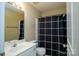 Bathroom with shower/tub combo and neutral decor at 8214 Chaceview Ct, Charlotte, NC 28269