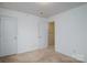 Spacious bedroom with neutral decor and carpet at 8214 Chaceview Ct, Charlotte, NC 28269