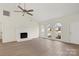 Bright living room with vaulted ceilings, fireplace, and hardwood floors at 9004 English Saddle Ln, Charlotte, NC 28273