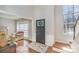 Inviting entryway with hardwood floors, stained-glass door, staircase and natural light at 100 Melrose Ct, Fort Mill, SC 29715