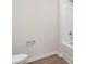Clean bathroom with a white tub and shower at 103 Adams Tree Way, Troutman, NC 28166