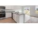 Kitchen boasts granite countertops and stainless steel appliances at 103 Adams Tree Way, Troutman, NC 28166