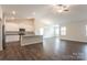 Open concept kitchen with island and stainless steel appliances at 111 Adams Tree Way, Troutman, NC 28166