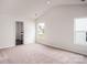 Spacious main bedroom with vaulted ceiling and carpet flooring at 111 Adams Tree Way, Troutman, NC 28166