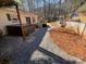 Hot tub and patio area, surrounded by trees at 119 Creek View Rd, Mooresville, NC 28117