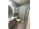 Bathroom with shower/tub combo and gray vanity at 119 Creek View Rd, Mooresville, NC 28117
