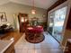 Cozy dining area with a round table and access to the backyard at 119 Creek View Rd, Mooresville, NC 28117