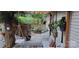 Cozy patio featuring a fire pit, hanging chair, and string lights at 119 Creek View Rd, Mooresville, NC 28117