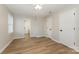 Well-lit bedroom with hardwood floors and ceiling fan at 123 Hemlock Dr, Salisbury, NC 28147