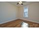 Well-lit bedroom with hardwood floors and a large window at 1487 Marshbrooke Ln, Catawba, NC 28609