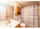 Small bathroom with shower/tub combo and wood vanity at 165 Pine Valley Dr, Stanley, NC 28164