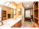 Bathroom with double vanity, shower, and tiled floor at 165 Pine Valley Dr, Stanley, NC 28164