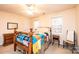 Bedroom with a full-size bed and wooden dresser at 165 Pine Valley Dr, Stanley, NC 28164
