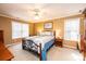 Cozy bedroom with a double bed and wooden furniture at 165 Pine Valley Dr, Stanley, NC 28164