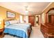 Main bedroom with a king-size bed and ensuite access at 165 Pine Valley Dr, Stanley, NC 28164