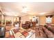 Spacious living room with hardwood floors and comfortable leather seating at 165 Pine Valley Dr, Stanley, NC 28164