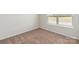 Empty bedroom with neutral-toned carpeting and window at 171 Wembury Ln, Troutman, NC 28166