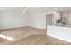 Spacious living room with carpeted floor and access to kitchen at 171 Wembury Ln, Troutman, NC 28166