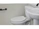 Updated bathroom with pedestal sink and modern fixtures at 188 Mary Cir, Concord, NC 28025
