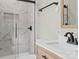 Updated bathroom with marble shower, modern fixtures, and a light vanity at 188 Mary Cir, Concord, NC 28025