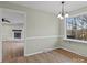 Bright dining area with hardwood floors and view of the backyard at 188 Mary Cir, Concord, NC 28025