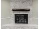 Stone fireplace with wood mantle in living room at 188 Mary Cir, Concord, NC 28025